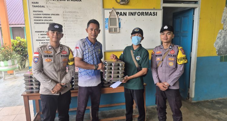 Polisi Kawal Distribusi 1.554 Porsi Makan Bergizi Gratis di Kecamatan Lingga
