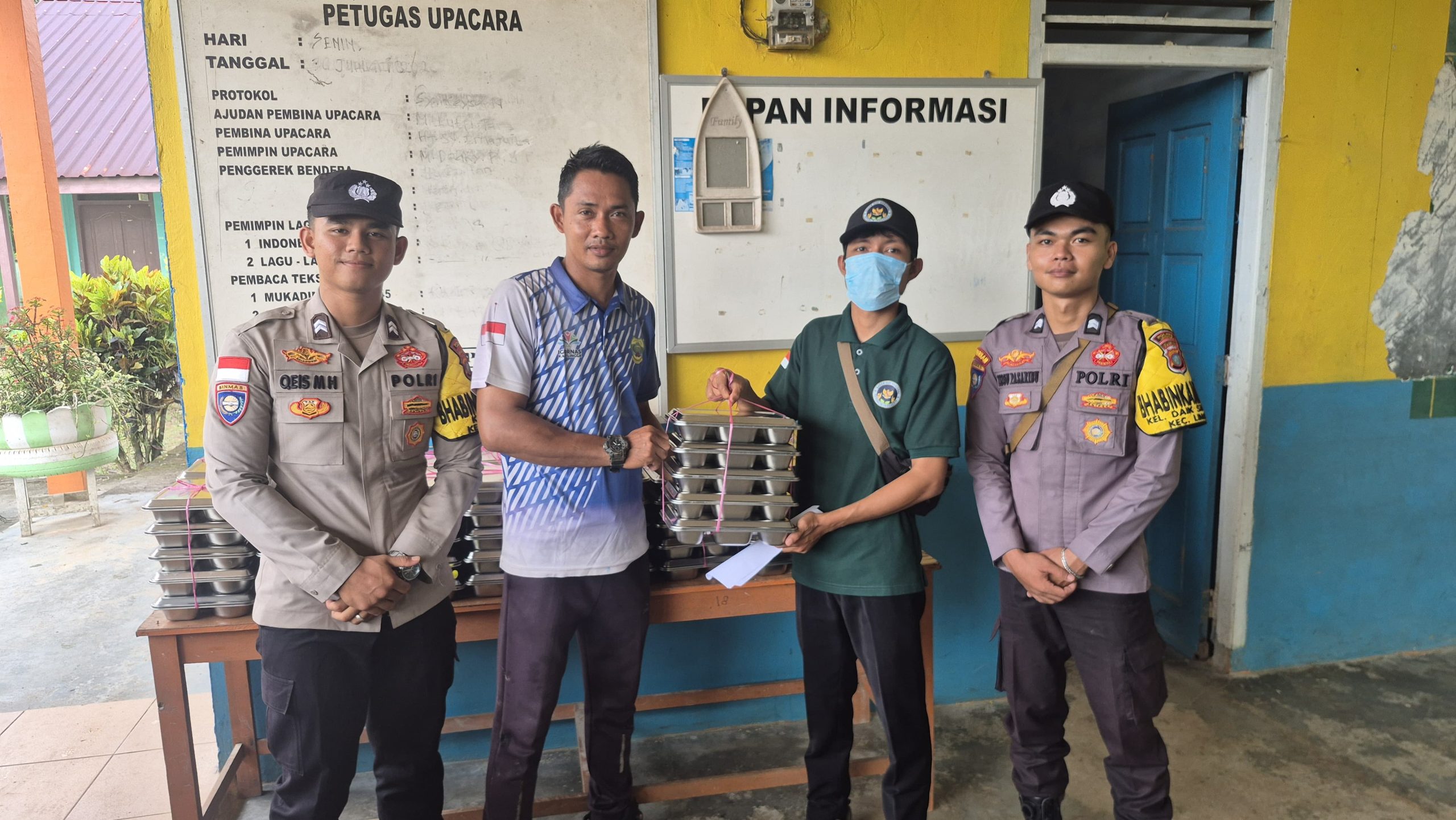 Polisi Kawal Distribusi 1.554 Porsi Makan Bergizi Gratis di Kecamatan Lingga